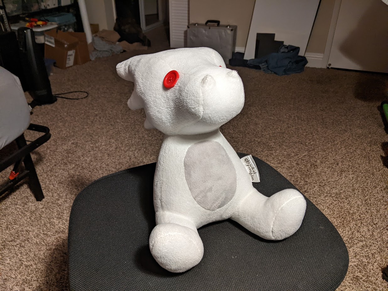 picture of a white fabric plush dragon